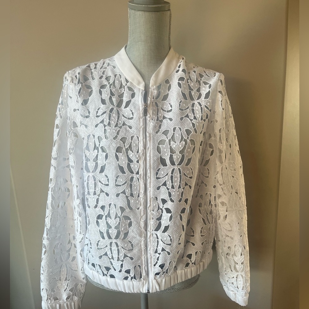 White lace-eyelet bomber jacket by Peter Nygård